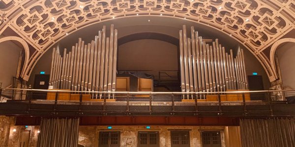 The organ pipes, without the console in the middle, installed in the balcony of our Grand Hall