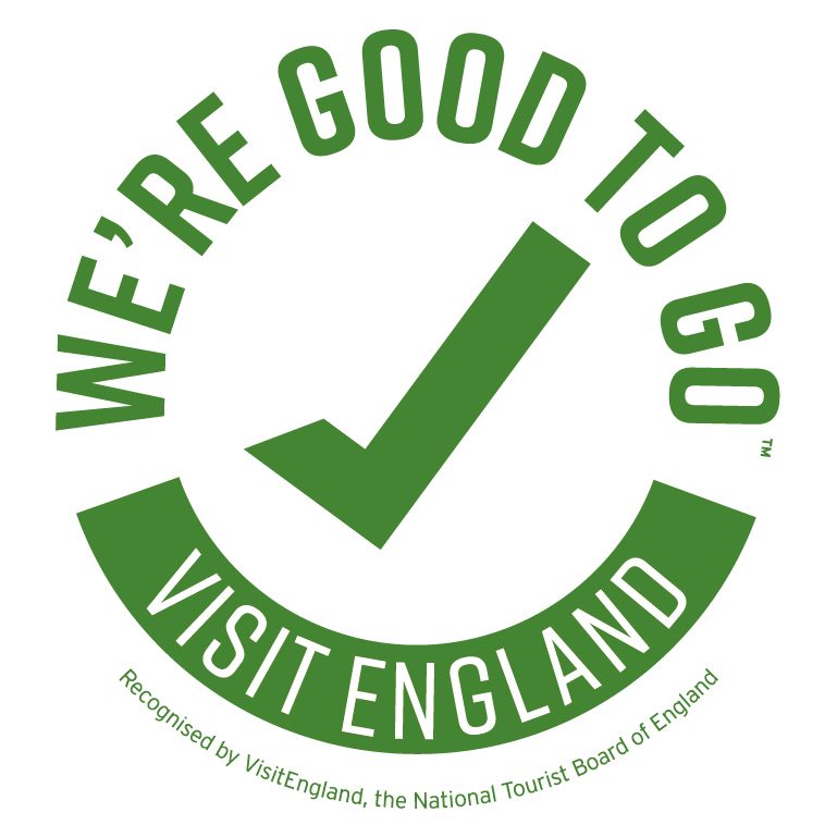 A green logo with text 'We're Good To Go Visit England' circling a large green tick.