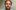 Mark Maughan_web A man with short curly brown hair and a beard.