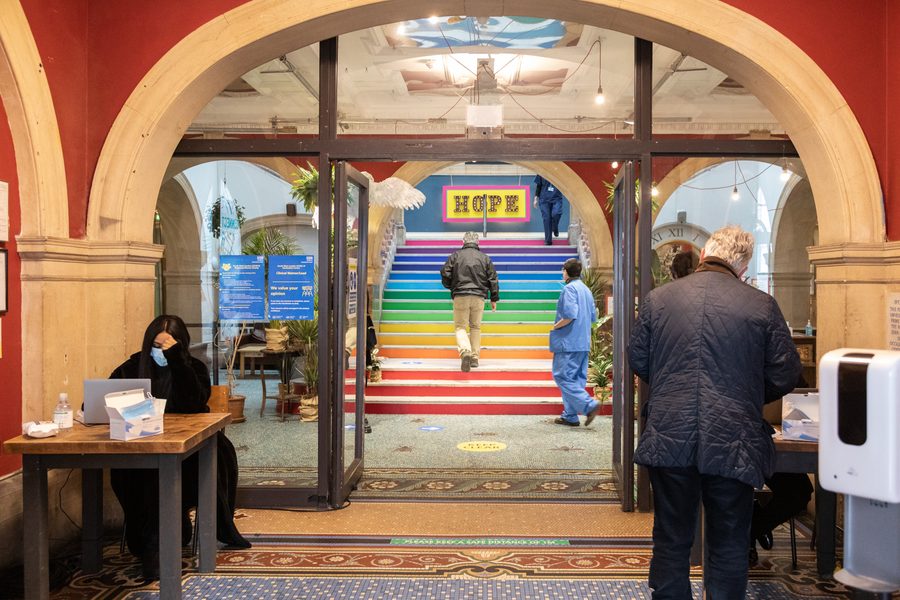 8 NHS Staff in NHS Community Vaccine Centre at Battersea Arts Centre. Credit Andy Barker