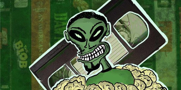 Drawing of figure in green half submerged in popcorn grinning in front of a video tape