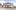 A Public Address © Harry Elletson L The exterior of Battersea Arts Centre from across the street. A large Victorian building with arched windows and a weather vane on its roof.